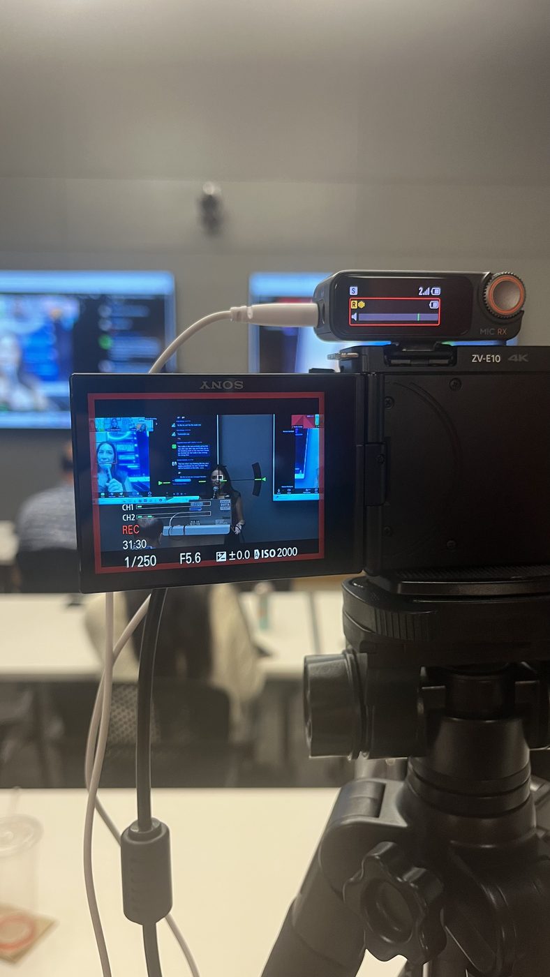 Sony ZV-E10 camera actively recording the certification training session with wireless microphone system