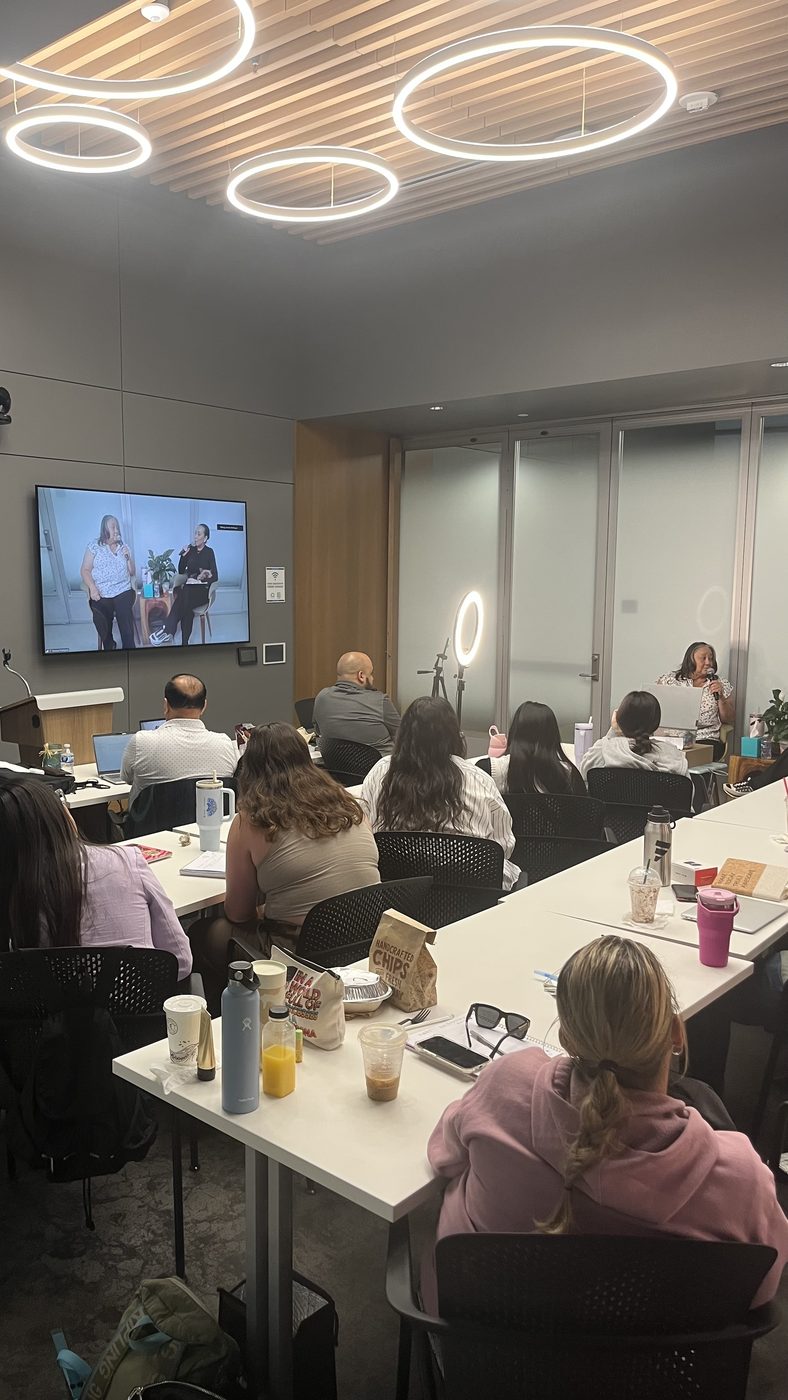 Full training room during the 40-hour certification program with attendees and live presentation